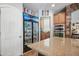 The updated kitchen features stainless appliances, walk in refrigerator, and large island at 11785 N 143Rd Dr, Surprise, AZ 85379