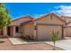Charming single-Gathering home featuring a two-car garage and low maintenance desert landscaping at 12109 N 127Th Dr, El Mirage, AZ 85335