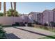 Stylish backyard with a brick paver patio, comfortable seating, and lush greenery for relaxation and entertaining at 13034 W Cheery Lynn Rd, Avondale, AZ 85392
