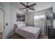 Bedroom boasts a large window, ceiling fan, and ample natural light at 13034 W Cheery Lynn Rd, Avondale, AZ 85392