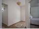 A welcoming foyer with tile flooring and a decorative pendant light at 13034 W Cheery Lynn Rd, Avondale, AZ 85392