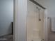 Bright shower featuring seating and chrome shower head at 13034 W Cheery Lynn Rd, Avondale, AZ 85392