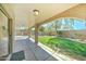 Covered patio offering an enjoyable view of the landscaped backyard at 1361 E Sheffield Ave, Gilbert, AZ 85296