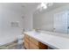 Bright bathroom with white subway tile, chevron niche, modern vanity and wood-look flooring at 1361 E Sheffield Ave, Gilbert, AZ 85296