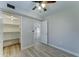 Bedroom with view to the living area, featuring a walk-in pantry with shelving at 1361 E Sheffield Ave, Gilbert, AZ 85296