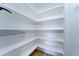 Walk-in pantry provides ample storage space with organized shelving at 1361 E Sheffield Ave, Gilbert, AZ 85296