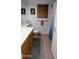 Bathroom with vanity, toilet, towel bar, and shower with blue curtain at 14968 N 134Th Ln, Surprise, AZ 85379