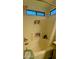 A well-lit bathroom tub and shower combo featuring a storage niche and modern fixtures at 14968 N 134Th Ln, Surprise, AZ 85379