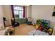 Bright bedroom with a large window and ample space for playing at 14968 N 134Th Ln, Surprise, AZ 85379