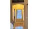 Hallway features decorative sign, neutral paint, and tiled flooring at 14968 N 134Th Ln, Surprise, AZ 85379