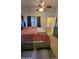 Spacious bedroom features ceiling fan, window, and dresser at 14968 N 134Th Ln, Surprise, AZ 85379