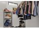 Well-organized closet featuring ample shelving, hanging space, and a variety of storage solutions at 1554 E Kings Ct, Gilbert, AZ 85234