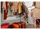 Functional closet space offering plenty of storage for clothes, luggage, and other personal items at 1554 E Kings Ct, Gilbert, AZ 85234