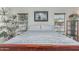 Comfortable main bedroom with ample light, calming decor, and quality furnishings at 16675 W Taylor St, Goodyear, AZ 85338