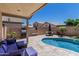 Beautiful outdoor space with a pool, patio furniture, and a built-in BBQ grill at 16675 W Taylor St, Goodyear, AZ 85338