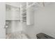 Bright walk-in closet with built-in shelving and ample storage space at 16675 W Taylor St, Goodyear, AZ 85338