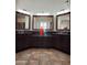 Bathroom featuring dual sinks and granite countertops at 1681 S Karen Dr, Chandler, AZ 85286