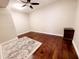 Bedroom with wood floors, ceiling fan, and area rug at 1681 S Karen Dr, Chandler, AZ 85286