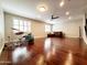 Expansive living room featuring hardwood floors, neutral walls, and abundant natural light at 1681 S Karen Dr, Chandler, AZ 85286
