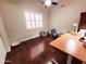 Bright office space with a dark wood floor, offering a comfortable and productive environment at 1681 S Karen Dr, Chandler, AZ 85286