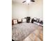 Spacious home office featuring a large built-in desk, providing ample workspace and storage at 1681 S Karen Dr, Chandler, AZ 85286
