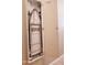 Convenient built-in ironing board tucked away in a cabinet at 1681 S Karen Dr, Chandler, AZ 85286