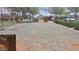 Horseshoe pits provide outdoor fun, set amongst green landscaping and mature trees for neighborhood residents at 18219 W La Senda Dr, Surprise, AZ 85387