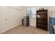 Bright bedroom featuring a closet, shelving, and large window, providing ample storage and natural light at 19042 E Arrowhead Trl, Queen Creek, AZ 85142