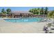 Relaxing community pool featuring ample seating and shaded lounge areas, perfect for leisurely days at 19042 E Arrowhead Trl, Queen Creek, AZ 85142