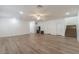 Spacious living room with recessed lighting, hardwood floors, and an open floor plan, perfect for entertaining at 19042 E Arrowhead Trl, Queen Creek, AZ 85142