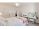 Inviting main bedroom with a comfortable bed, vanity area, and ample closet space for a relaxing retreat at 19042 E Arrowhead Trl, Queen Creek, AZ 85142