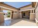 A welcoming outdoor patio space with elegant columns at 19042 E Arrowhead Trl, Queen Creek, AZ 85142