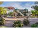Community playground featuring climbing structures, slides, and swings, providing a fun and safe recreation area for children at 19042 E Arrowhead Trl, Queen Creek, AZ 85142