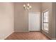 Dining room with a chandelier, neutral walls, and tile flooring at 1976 N Lemon Tree Ln # 16, Chandler, AZ 85224
