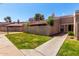 A charming home with a well maintained lawn and desert landscaping at 1976 N Lemon Tree Ln # 16, Chandler, AZ 85224