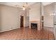 Spacious living area featuring a fireplace, tile flooring, and neutral colored walls at 1976 N Lemon Tree Ln # 16, Chandler, AZ 85224
