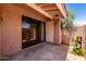 The back patio has a sliding glass door that enters into the home at 1976 N Lemon Tree Ln # 16, Chandler, AZ 85224