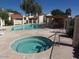 Community pool and hot tub with comfortable seating available for residents' enjoyment at 1976 N Lemon Tree Ln # 16, Chandler, AZ 85224