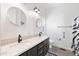 Updated bathroom featuring double sinks, modern fixtures, and neutral tones at 201 S Greenfield Rd # 215, Mesa, AZ 85206