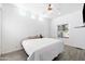 Bedroom with white walls and modern finishes including a comfortable bed at 201 S Greenfield Rd # 215, Mesa, AZ 85206