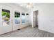 Bright sun room with views of the surrounding landscape and tile flooring at 201 S Greenfield Rd # 215, Mesa, AZ 85206