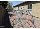 Backyard with play equipment and desert landscaping at 20243 E Poco Calle --, Queen Creek, AZ 85142