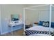 Bedroom with shutters and modern white canopy bed at 20243 E Poco Calle --, Queen Creek, AZ 85142