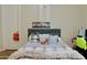 Cozy bedroom featuring a plush bed, stylish decor, and a peaceful ambiance at 20243 E Poco Calle --, Queen Creek, AZ 85142