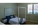 Bedroom with shutters and modern white canopy bed at 20243 E Poco Calle --, Queen Creek, AZ 85142