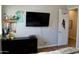 Well-designed bedroom with sports decor, a flat screen television, and mini-basketball hoop at 20243 E Poco Calle --, Queen Creek, AZ 85142