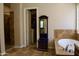 Ensuite bathroom with tiled walk-in shower, soaking tub, and custom storage cabinet and mirror at 20243 E Poco Calle --, Queen Creek, AZ 85142