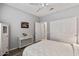 Bedroom featuring closet, console table, ceiling fan and wood floors at 20450 N Shadow Mountain Dr, Surprise, AZ 85374