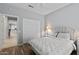Comfortable bedroom with ceiling fan, double door closet and soft, natural light at 20450 N Shadow Mountain Dr, Surprise, AZ 85374