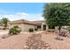 Charming single-story home with desert landscaping, rock accents, and a tiled roof at 20450 N Shadow Mountain Dr, Surprise, AZ 85374